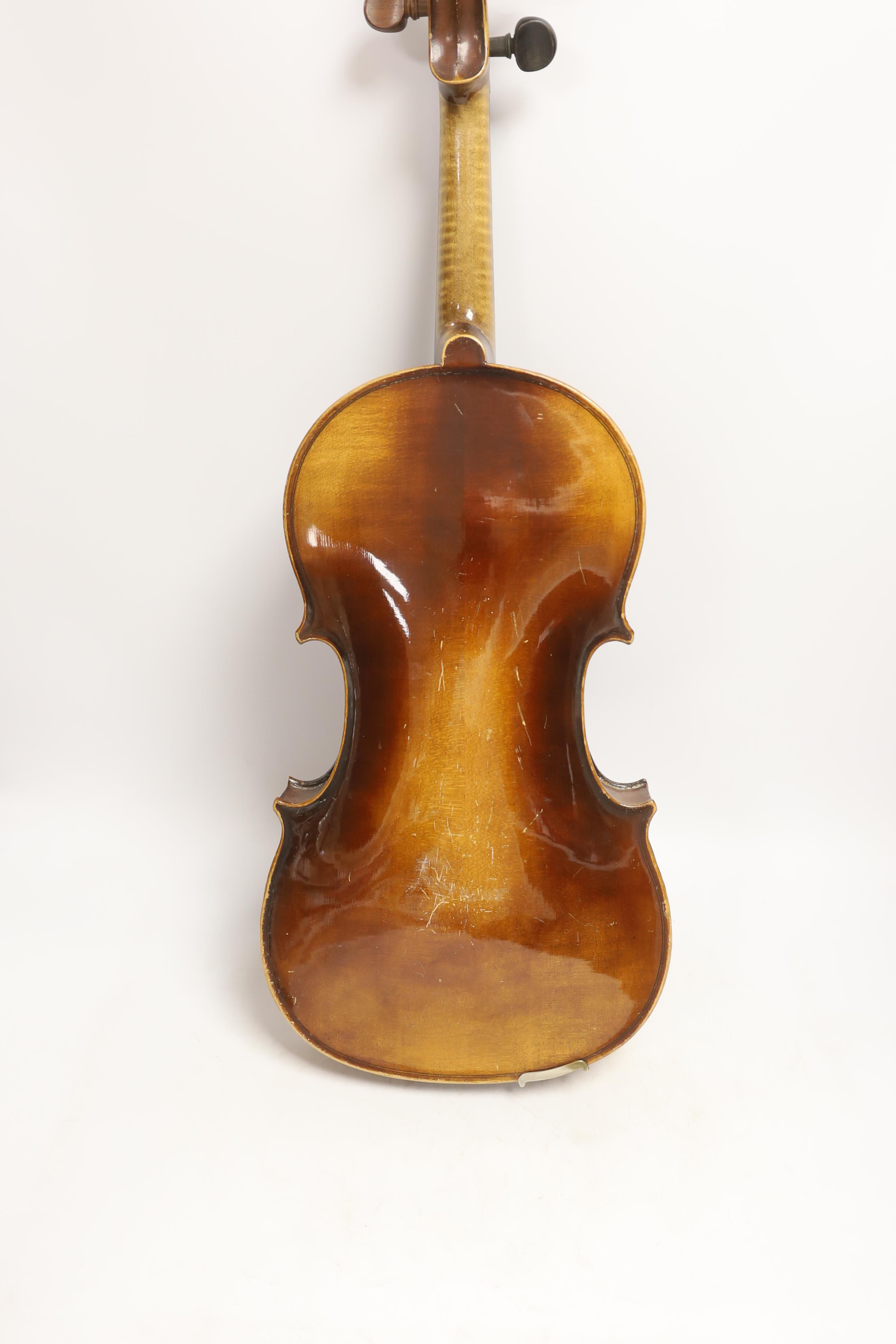 A German Strad violin, back measures 39.5cm, with bow